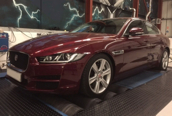 Red Jaguar XE on a rolling Road Dyno 3/4 view from the front of the car Jaguar XE Remap And Tuning