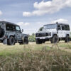 2 x land rover defenders on photoshoot in field