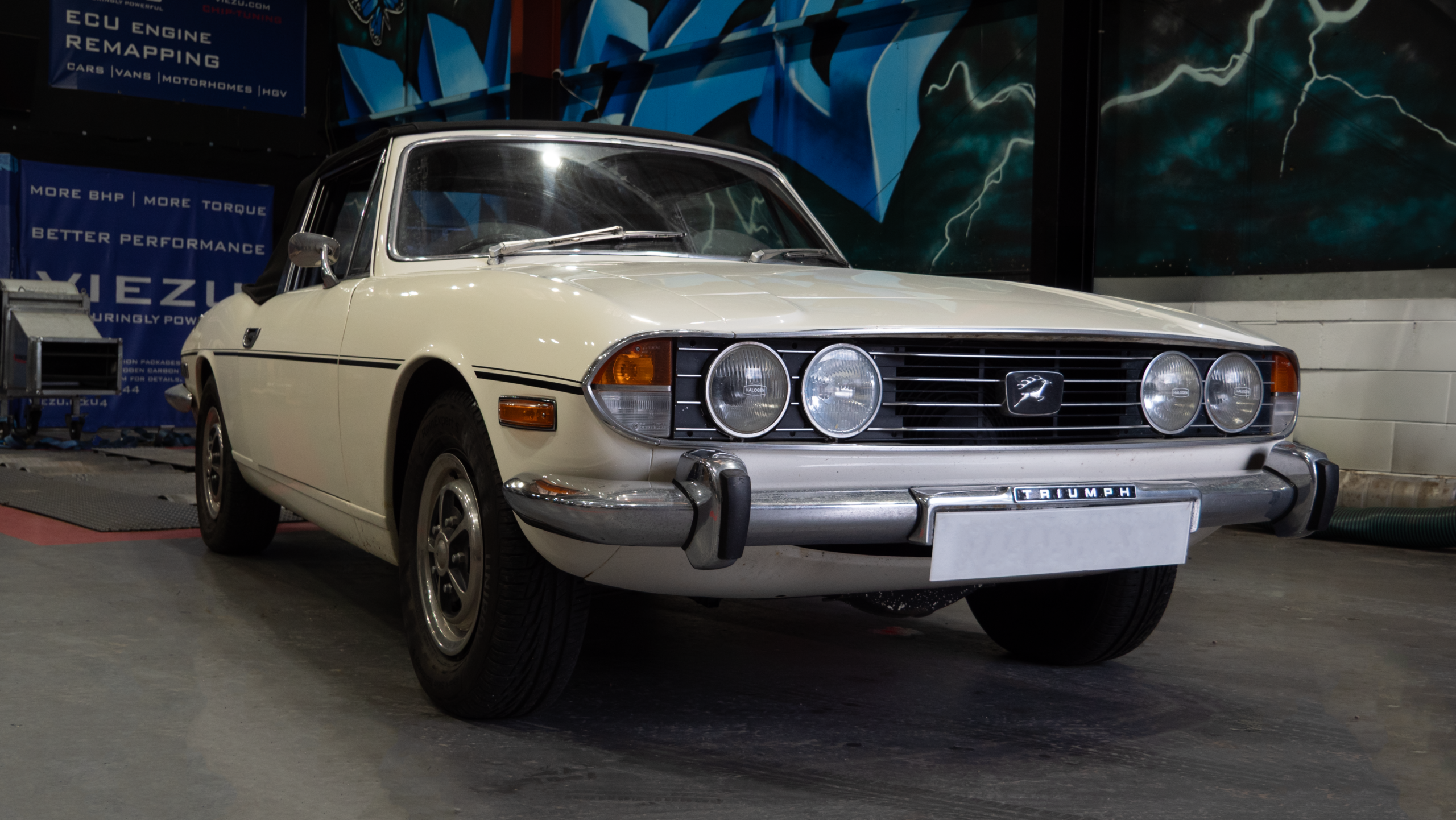 Triumph stag exhaust frontview scaled